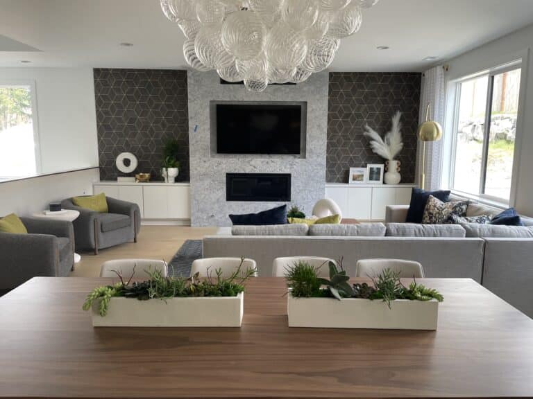 A modern interior space featuring a stylish table, ready for use, suggesting a contemporary dining or meeting area.