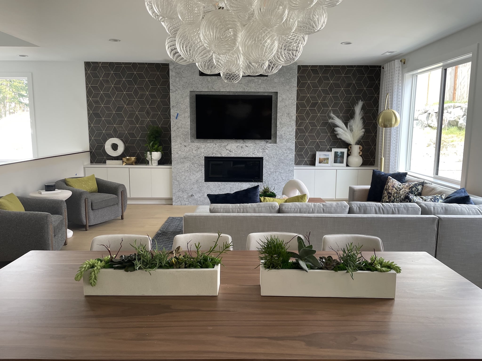 A modern interior space featuring a stylish table, ready for use, suggesting a contemporary dining or meeting area.